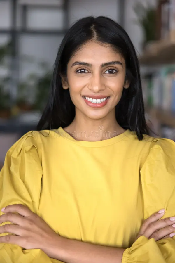 young-s-confident-indian-woman-smiling-looking-camera-young-s-confident-indian-woman-smiling-looking-camera-exuding-394618728